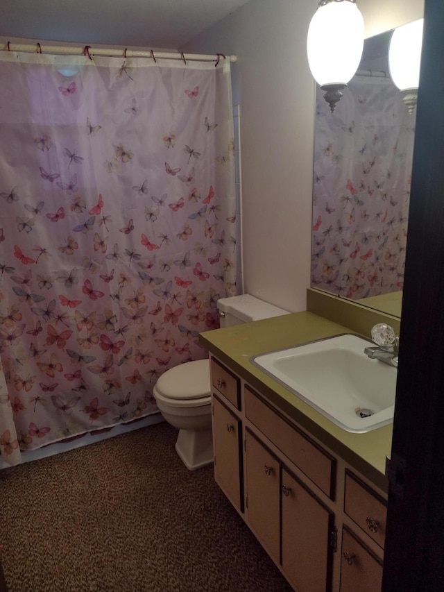 full bathroom featuring vanity, toilet, and shower / bathtub combination with curtain