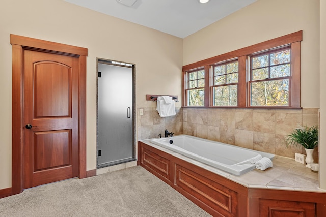 bathroom featuring plus walk in shower