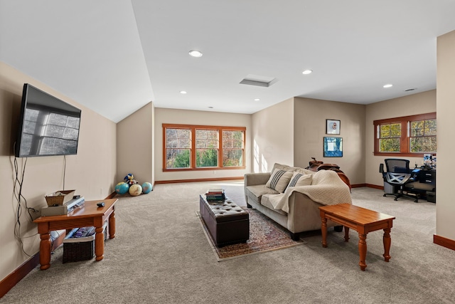 living room with light colored carpet and lofted ceiling