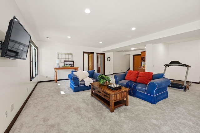 living room featuring light carpet