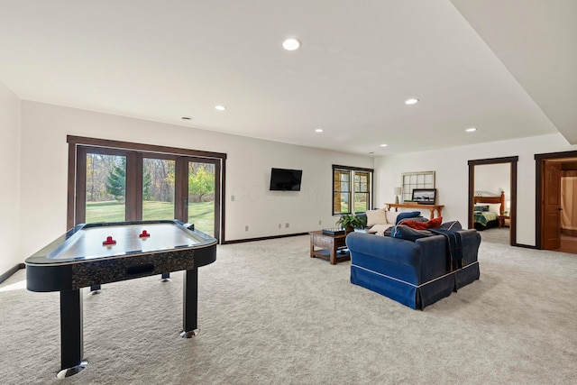 game room with light colored carpet