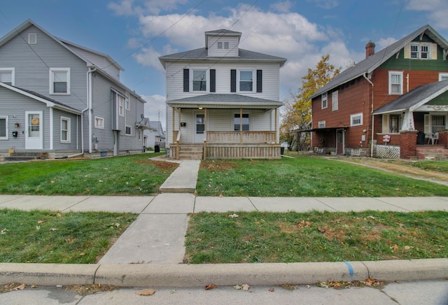 view of front facade featuring a porch and a front yard