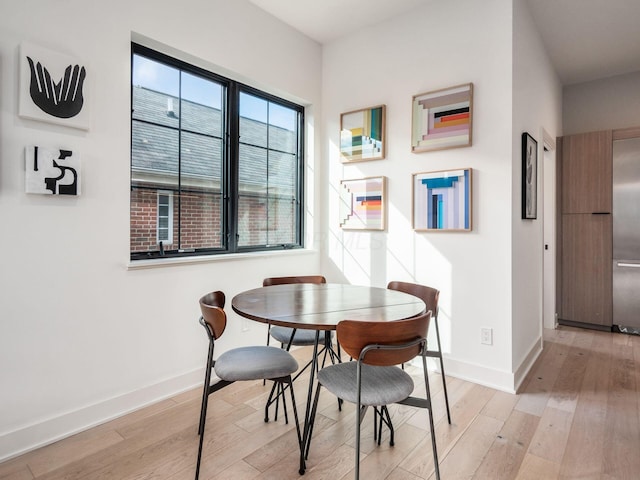 dining area featuring light hardwood / wood-style flooring