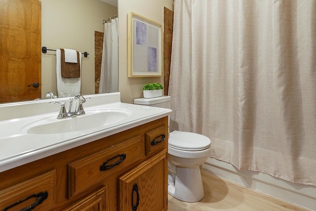 full bath with toilet, vanity, and shower / tub combo with curtain