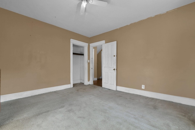 unfurnished bedroom with ceiling fan and light carpet