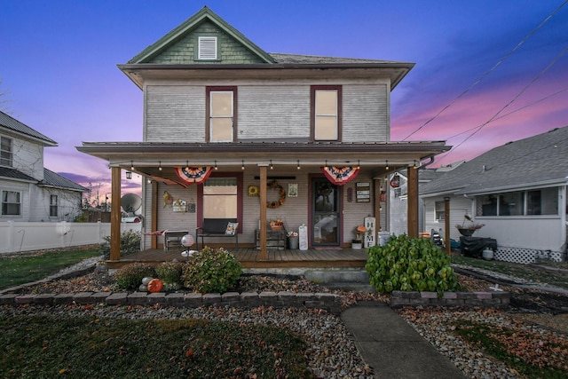 view of front facade featuring covered porch