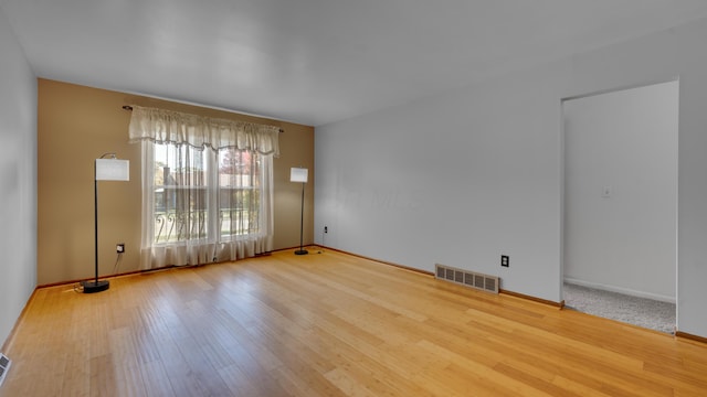 empty room featuring light hardwood / wood-style floors