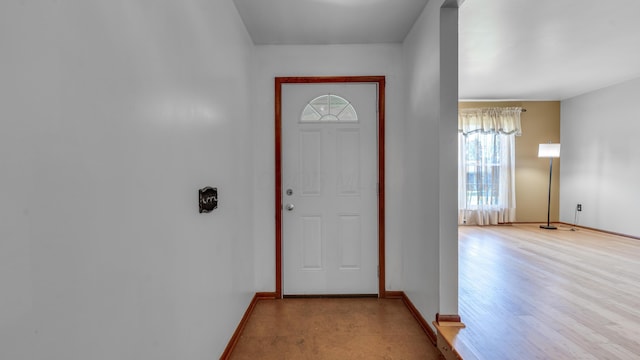 entryway with light hardwood / wood-style flooring