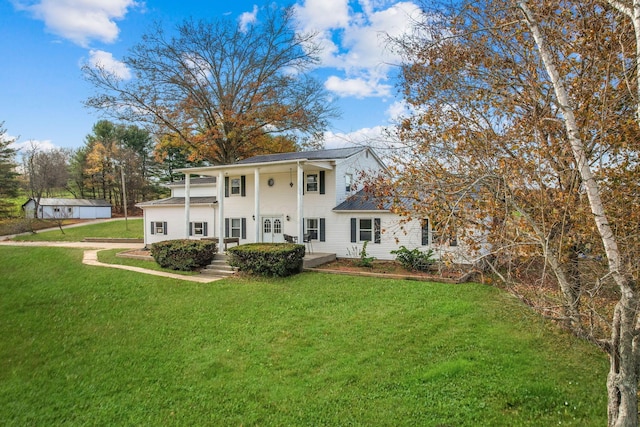 view of front of home with a front yard