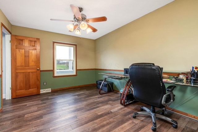 office area featuring ceiling fan and dark wood-type flooring