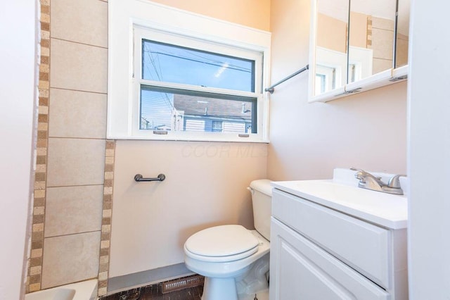 full bathroom featuring vanity, hardwood / wood-style flooring, toilet, and separate shower and tub