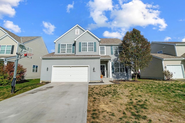 view of front of property featuring a garage and a front lawn