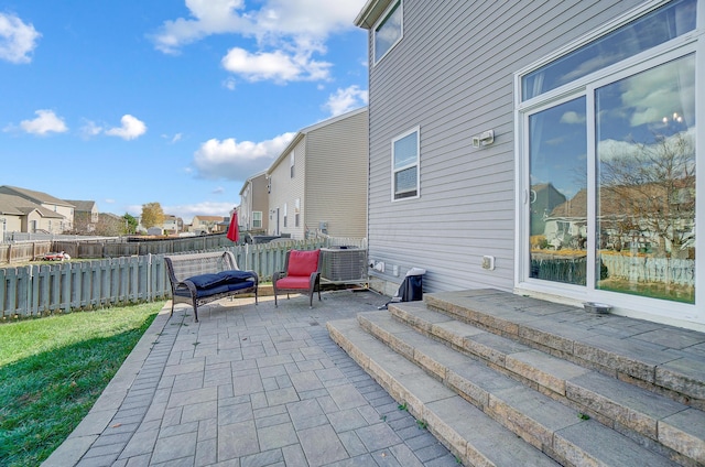 view of patio with central AC unit