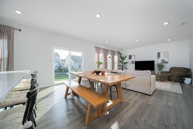 dining area with hardwood / wood-style flooring