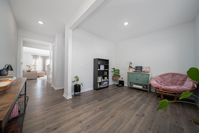 sitting room featuring dark hardwood / wood-style flooring