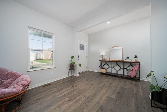 living area featuring dark hardwood / wood-style floors