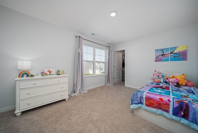 bedroom with light colored carpet