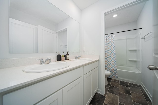 full bathroom with vanity, toilet, and shower / tub combo with curtain