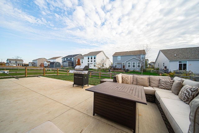 view of patio featuring an outdoor living space and grilling area