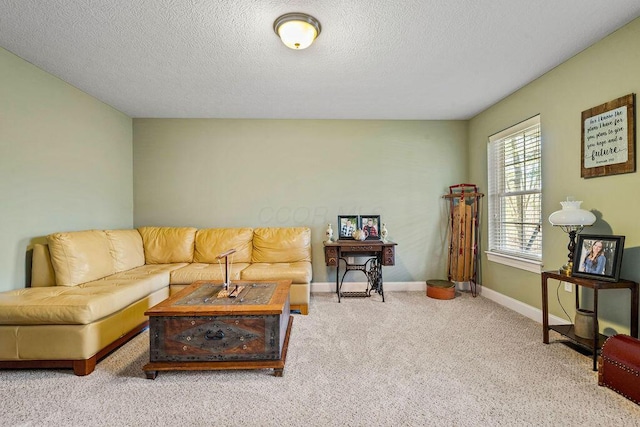 carpeted living room with a textured ceiling and baseboards