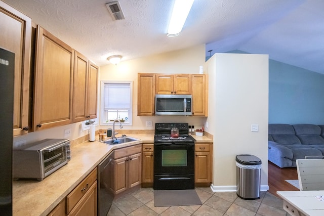 kitchen featuring black range with electric stovetop, vaulted ceiling, dishwasher, and sink