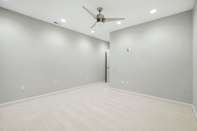 carpeted empty room with ceiling fan