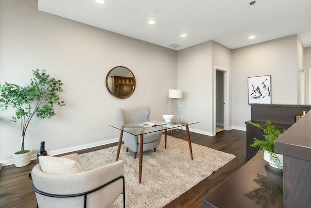 home office featuring dark hardwood / wood-style flooring