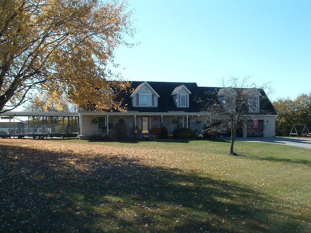 cape cod-style house with a front lawn