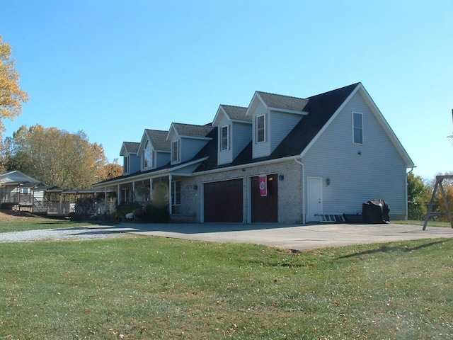 view of property exterior featuring a lawn and a garage