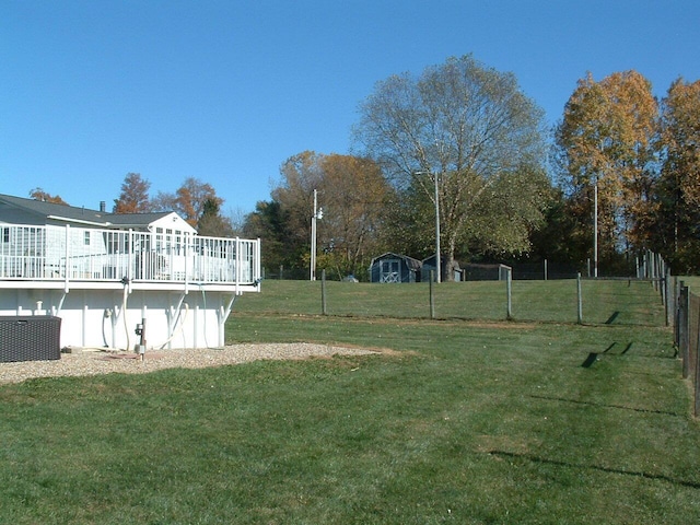 view of yard featuring a wooden deck