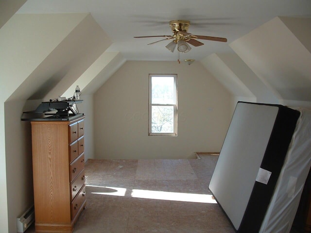 bonus room featuring a baseboard radiator, ceiling fan, and lofted ceiling