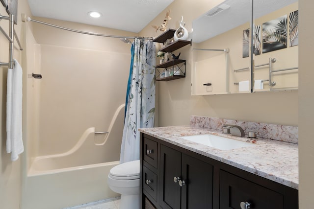 full bathroom featuring shower / bathtub combination with curtain, vanity, toilet, and tile patterned floors