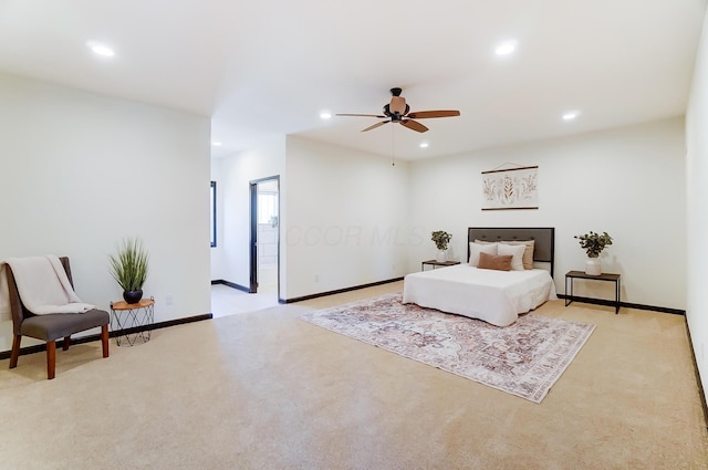 carpeted bedroom featuring ceiling fan