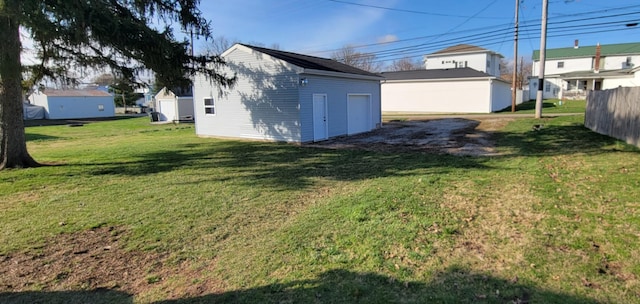 view of yard with an outdoor structure