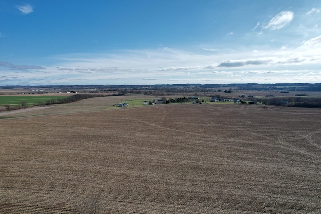 birds eye view of property featuring a rural view