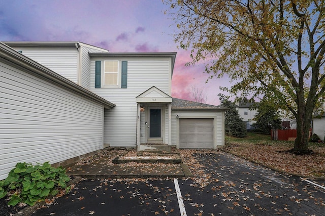 front of property featuring a garage