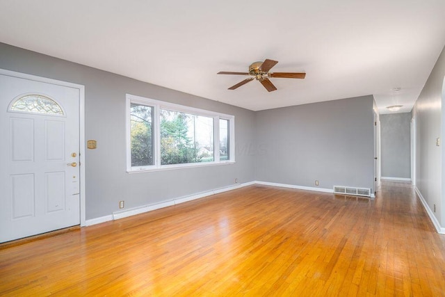 entrance foyer featuring hardwood / wood-style flooring and ceiling fan