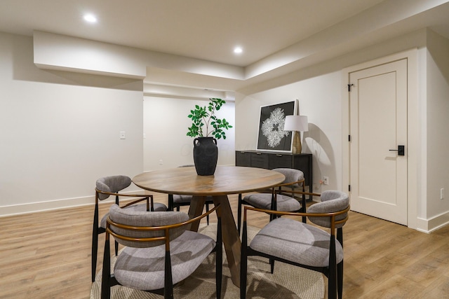 dining room with light hardwood / wood-style floors