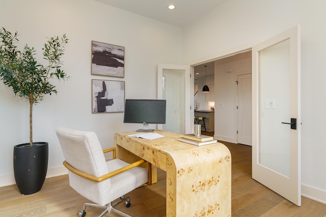 office with hardwood / wood-style floors