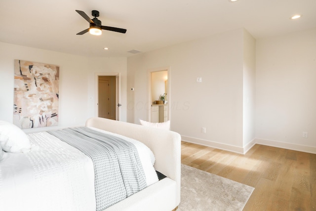 bedroom featuring light wood-type flooring and ceiling fan