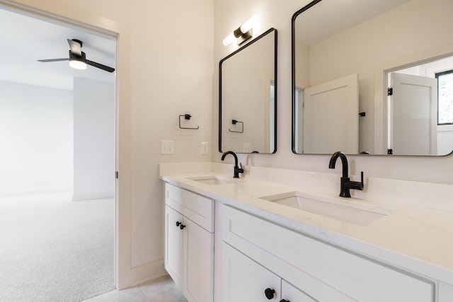 bathroom featuring ceiling fan and vanity