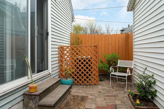 view of patio with fence