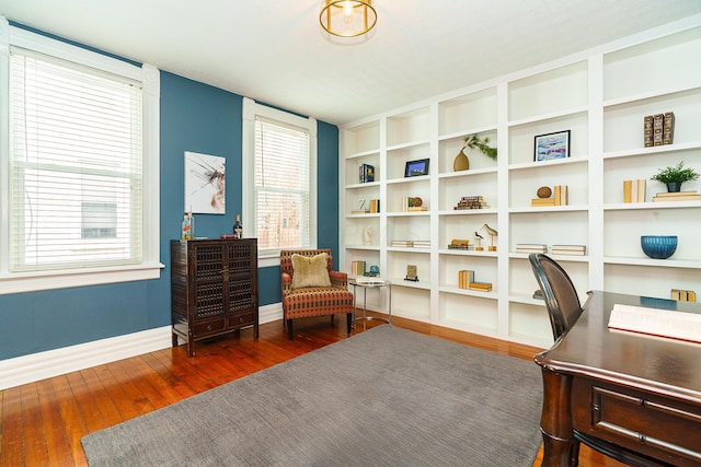 office with baseboards and dark wood finished floors