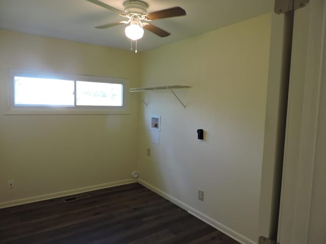 washroom featuring dark hardwood / wood-style floors, ceiling fan, and hookup for a washing machine