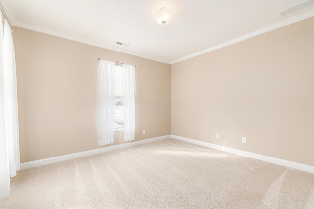 unfurnished room featuring crown molding and light colored carpet