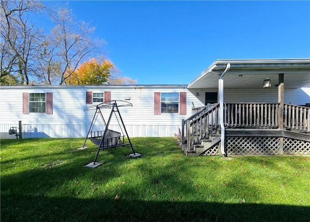 back of house with a yard