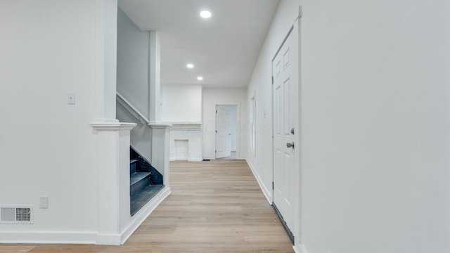 corridor featuring light wood-type flooring