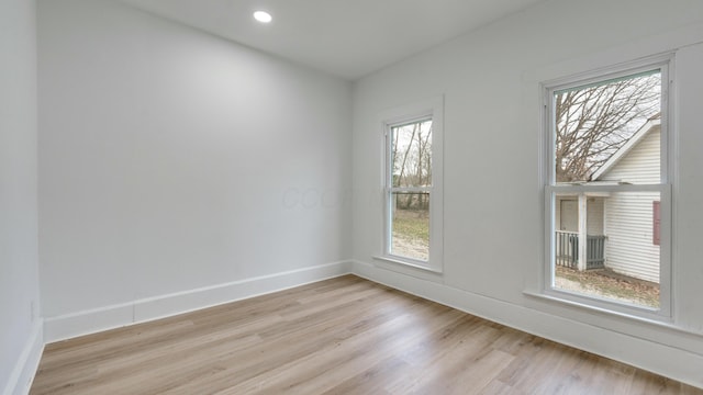 empty room with light wood-type flooring