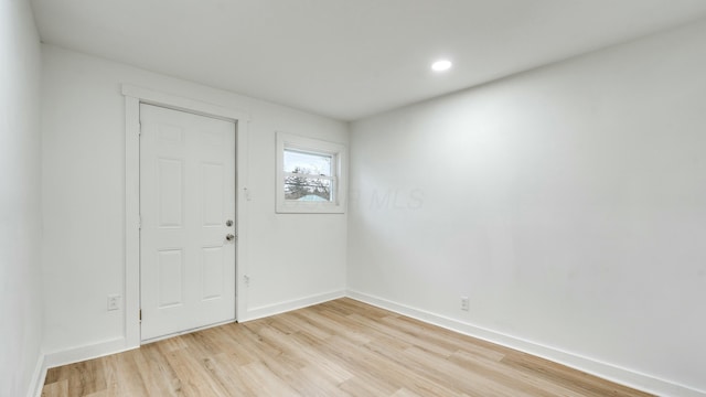 foyer with light wood-type flooring