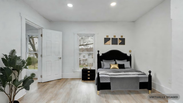 bedroom featuring light hardwood / wood-style flooring